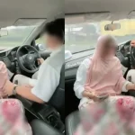 Pasangan bermanja semasa memandu