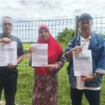 pesawah buat laporan polis