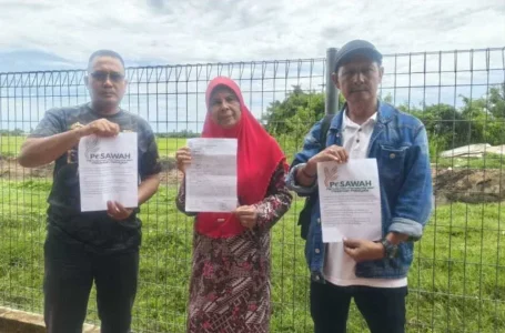 pesawah buat laporan polis