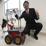 robot kutip buah sawit relai